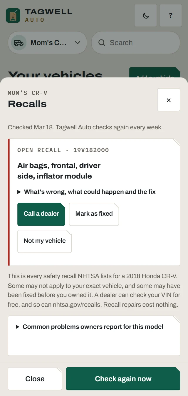An open recall for the driver air bag, with buttons to call a dealer or mark it fixed